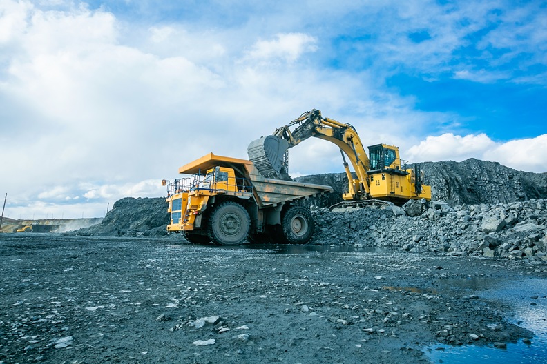 work,of,trucks,and,the,excavator,in,an,open,pit work,of,trucks,and,the,excavator,in,an,open,pit